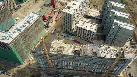 MOSCOW, RUSSIA - MAY, 24, 2017. Aerial shot of modern apartment buildings Zilart construction siteのeditorial素材