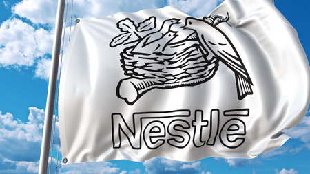 Waving flag with Nestle logo against sky and clouds. Editorial 3D renderingのeditorial素材