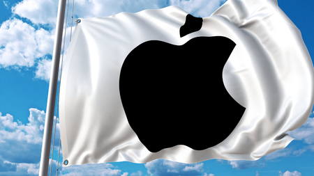 Waving flag with Apple logo against sky and clouds. Editorial 3D rendering