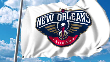 Waving flag with New Orleans Pelicans professional team logo. Editorial 3D renderingのeditorial素材