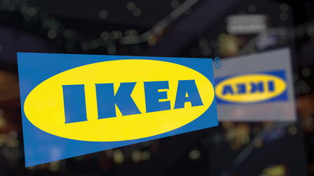 Ikea logo on the glass against blurred business center. Editorial 3D renderingのeditorial素材