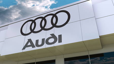 Audi logo on the modern building facade. Editorial 3D renderingのeditorial素材