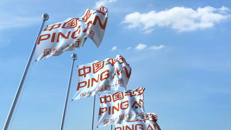 Waving flags with Ping An Insurance logo against sky, editorial 3D rendering