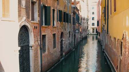 VENICE, ITALY - AUGUST 8, 2017. Venetian canal and ancient buildings, view from a bridgeのeditorial素材