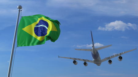Commercial airplane landing behind waving Brazilian flag. Travel to Brazil conceptual 3D renderingの写真素材