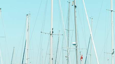 PULA, CROATIA - AUGUST 4, 2017. Moored sailboats masts at piersのeditorial素材