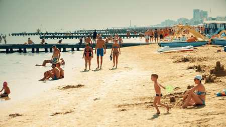 LIDO DI JESOLO, ITALY - AUGUST 8, 2017. Big crowded sandy beach. Summer vacation timeのeditorial素材