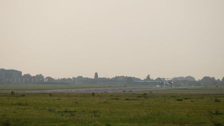 WARSAW, POLAND - AUGUST 31, 2017. Turboprop commercial airplane landing at the Chopin international airportのeditorial素材