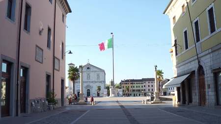 PALMANOVA, ITALY - AUGUST 11, 2017. Italian flag in the very center of the city squareのeditorial素材