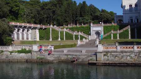TRIESTE, ITALY - AUGUST 11, 2017. Miramare castle park and embankmentのeditorial素材