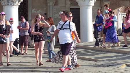VENICE, ITALY - AUGUST 8, 2017. Crowded tourist place near the famous Doges Palace, one of the main landmarks of the cityのeditorial素材