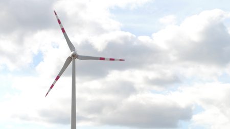 AUSTRIA - AUGUST 12, 2017. Wind generator against cloudy skyのeditorial素材