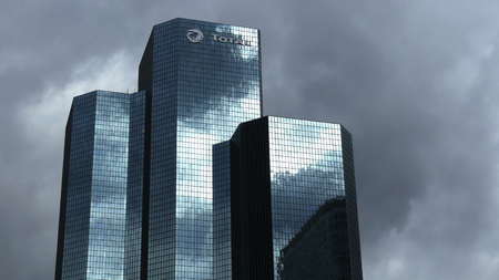 PARIS, FRANCE - OCTOBER 8, 2017. Cloudy sky reflecting in Total S.A. headquarters skyscrapersのeditorial素材