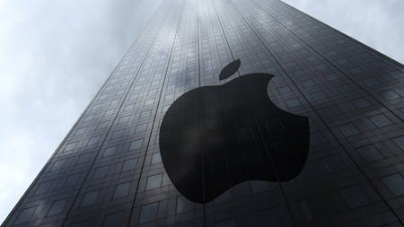Apple Inc. logo on a skyscraper facade reflecting clouds. Editorial 3D renderingのeditorial素材