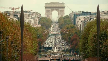 PARIS, FRANCE - OCTOBER 8, 2017. Car traffic jam near famous Arc de Triomphe or Triumphal Arch,...