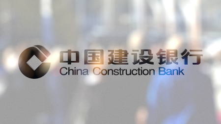 China Construction Bank logo on a glass against blurred crowd on the steet. Editorial 3D renderingのeditorial素材