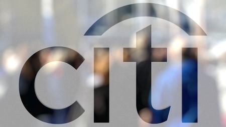 Citigroup logo on a glass against blurred crowd on the steet. Editorial 3D renderingのeditorial素材