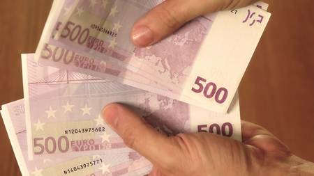 Counting five hundred euro banknotes close-up shot