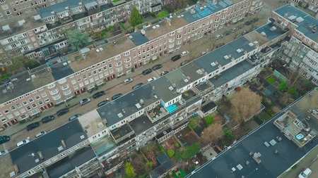 Aerial down view to apartment buildings and inner gardens and courtyards in Amsterdam, Netherlandsの写真素材