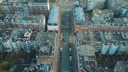 AMSTERDAM, NETHERLANDS - JANUARY 1, 2018. Aerial view of city street, apartment buildings and inner courtyardsのeditorial素材