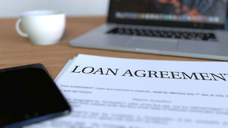 Copy of loan agreement on the desk. 3D rendering