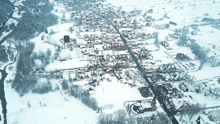 Aerial shot of Bialka Tatrzanska village in southern Poland during winterの写真素材