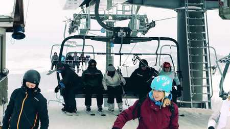 BIALKA TATRZANSKA, POLAND - FEBRUARY 3, 2018. Alpine ski lift or chairlift station at the top of the mountainのeditorial素材