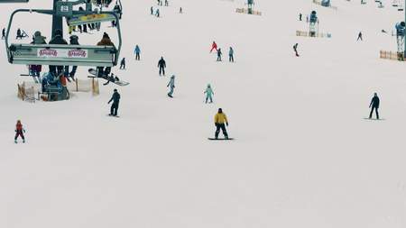 BIALKA TATRZANSKA, POLAND - FEBRUARY 4, 2018. Skiers and snowboarders on the mountain ski slopeのeditorial素材