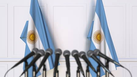 Argentinian official press conference. Flags of Argentina and microphones. Conceptual 3D renderingの写真素材