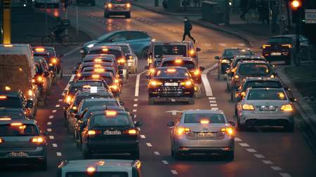 WARSAW, POLAND - MARCH 12, 2018. Major city street traffic at roads intersection in the evening