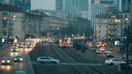 WARSAW, POLAND - MARCH 12, 2018. Major city street traffic in the eveningのeditorial素材