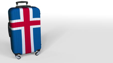 Travelers suitcase featuring flag of Iceland. Icelandic tourism conceptual 3D rendering, blank space for captionの写真素材
