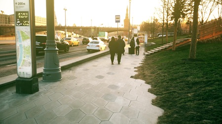 MOSCOW, RUSSIA - APRIL 15, 2018. People walk by Zaryadye park near the Kremlin in the eveningのeditorial素材