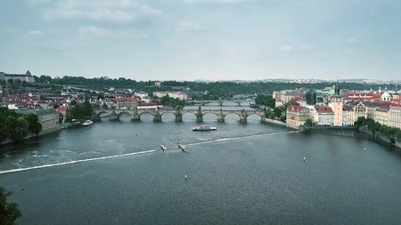 Aerial view of crowded famous Charles Bridge in Prague and Vltava riverbanks, the Czech Republicの写真素材