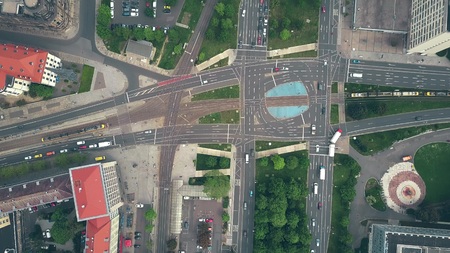 Aerial top down view of traffic at major city road intersectionの写真素材