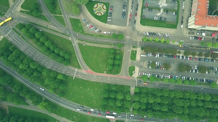 Aerial top down view of traffic on European city roads