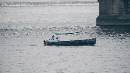 PRAGUE, CZECH REPUBLIC - MAY 3, 2018. Sailors in a motorboat