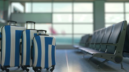 Travel suitcases featuring flag of Greece. Greek tourism conceptual 3D renderingの写真素材
