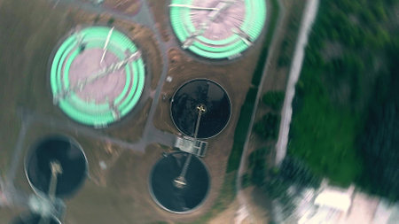 Aerial top down rotating shot of water treatment plantの写真素材
