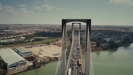 Aerial view of cable-stayed Centennial Bridge in Sevilla, Spainの写真素材