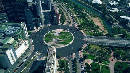 VALENCIA, SPAIN - SEPTEMBER 22, 2018. Aerial view of shopping mall Corte Ingles and city roundabout trafficのeditorial素材