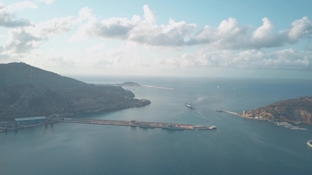 Aerial view of big ship entering harbour of Cartagena, Spainの写真素材