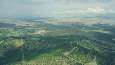 Aerial shot of distant solar power plant in Sierra Nevada mountains, Spainの写真素材