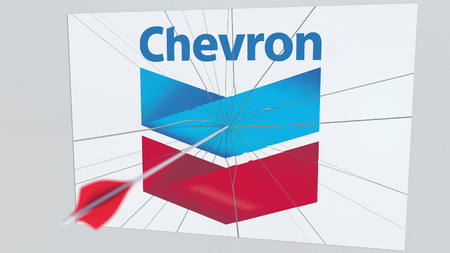 CHEVRON company logo being cracked by archery arrow. Corporate problems conceptual editorial 3D renderingのeditorial素材