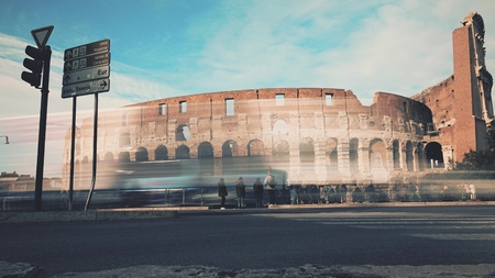 Crowded square near famous Colosseum or Coliseum amphitheatre in Rome, Italyの写真素材