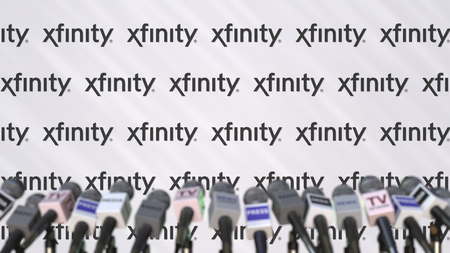 XFINITY company press conference, press wall with logo and mics, conceptual editorial 3D renderingのeditorial素材