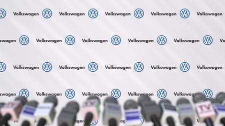 VOLKSWAGEN company press conference, press wall with logo and mics, conceptual editorial 3D...