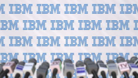 Media event of IBM, press wall with logo and microphones, editorial 3D renderingのeditorial素材