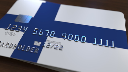 Plastic bank card featuring flag of Finland. Finnish national banking system related 3D renderingの写真素材
