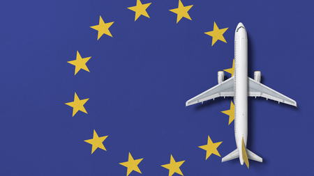 Commercial airplane on the flag of the European Union EU. Travel related conceptual 3D renderingの写真素材